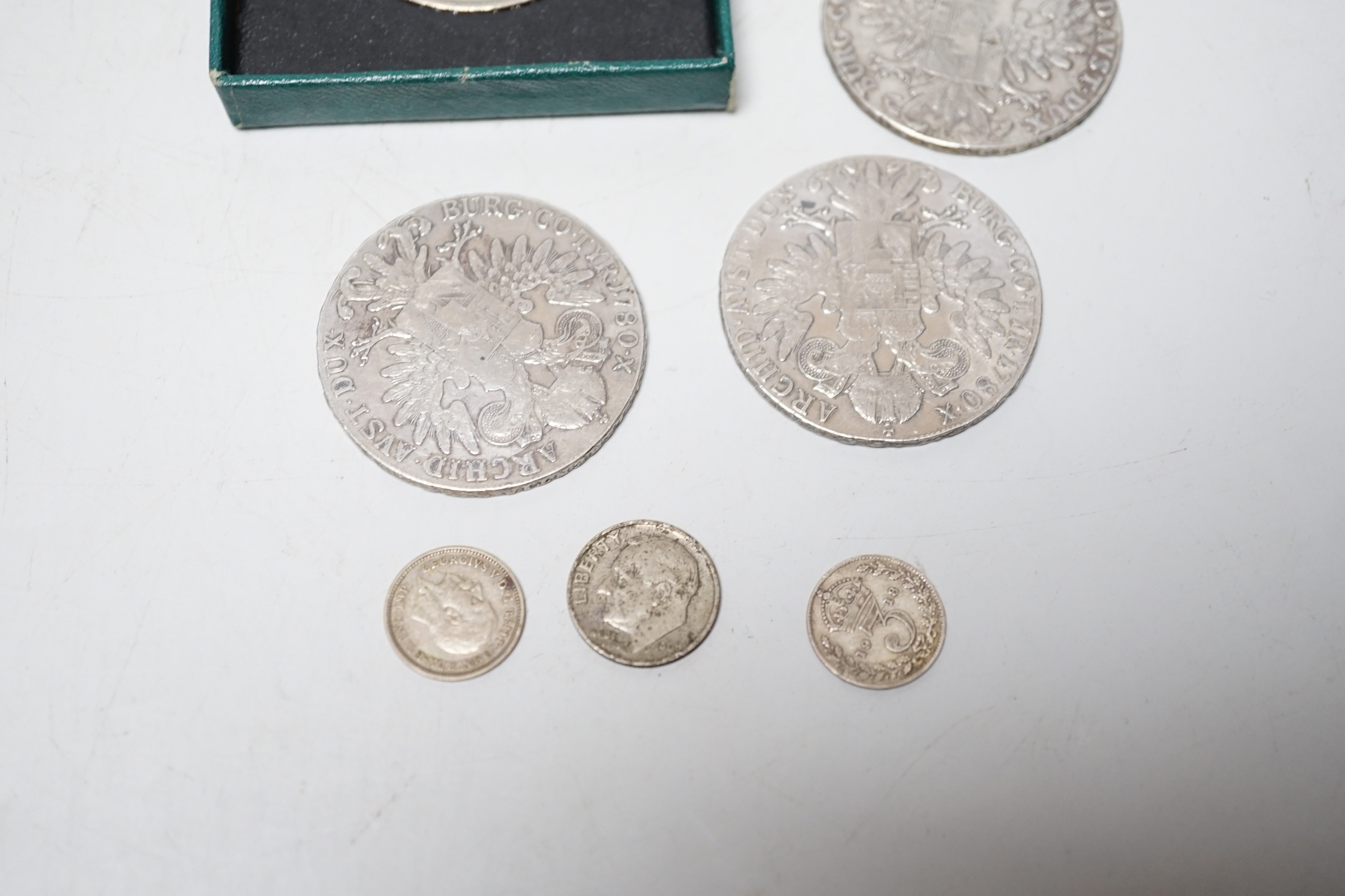 7 assorted coins.